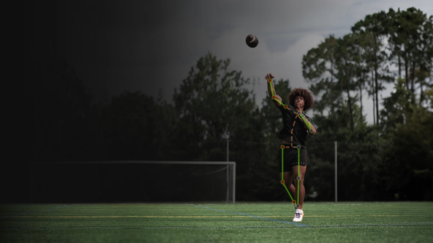 Picture of a youth quarterback throwing a football